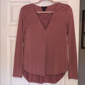 Long sleeve cross neck shirt.